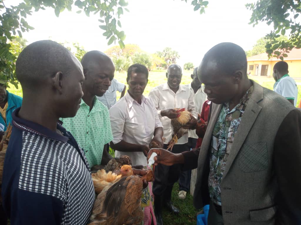 Mr Emmy Ojirot, the deputy resident district commissioner launching the paultry vaccination program on Tuesday Mr Emmy Ojirot, the deputy resident district commissioner launching the paultry vaccination program on Tuesday