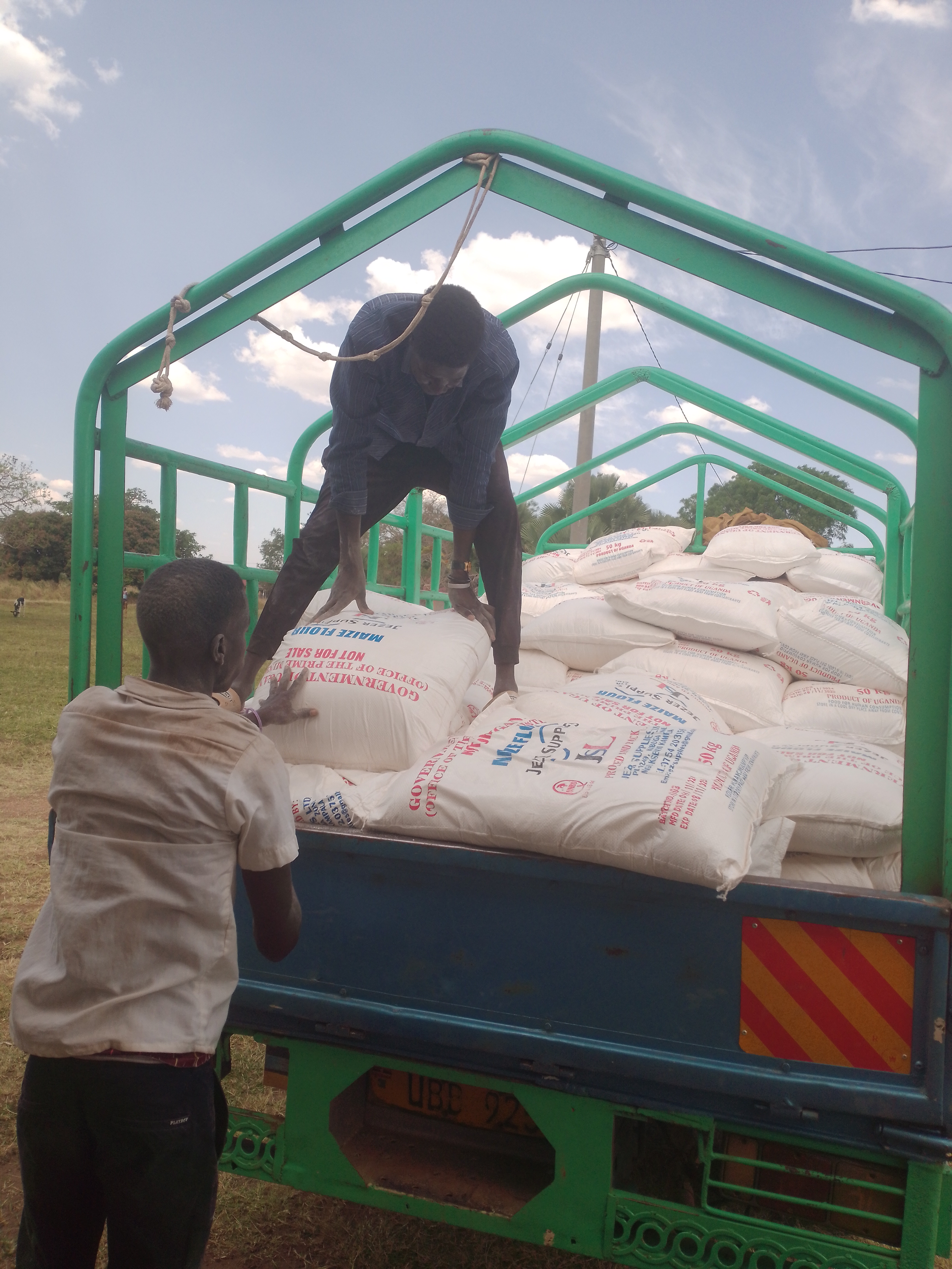 The food relief being loaded on trucks for transportation to the sub counties in Kapelebyong TC on Friday. Photo by Emmanuel Opio The food relief being loaded on trucks for transportation to the sub counties in Kapelebyong TC on Friday. Photo by Emmanuel Opio